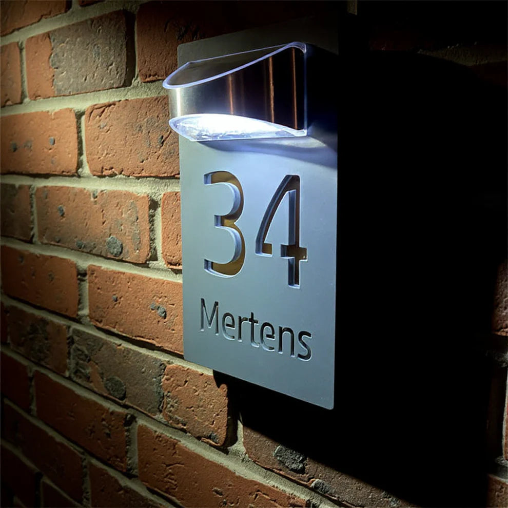 Personalized solar-powered house number sign